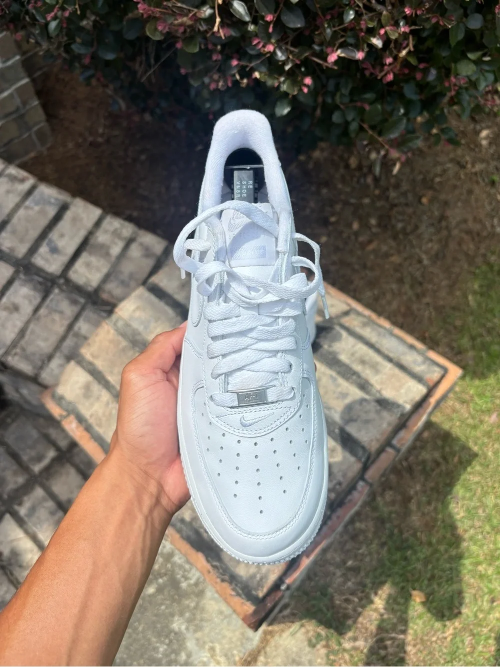 Nike White Low-Top Leather Sneaker with Red Supreme Box Logo